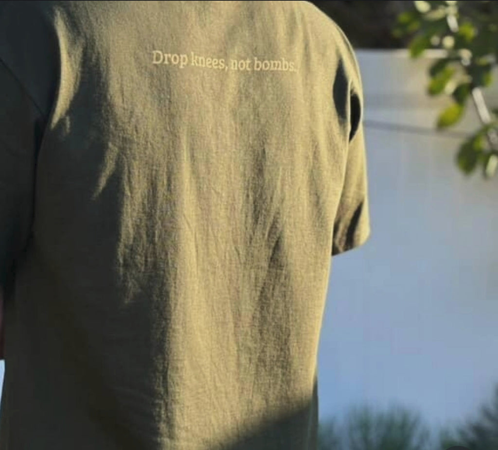 Forest Green tee - back with Drop Knees Not Bombs text